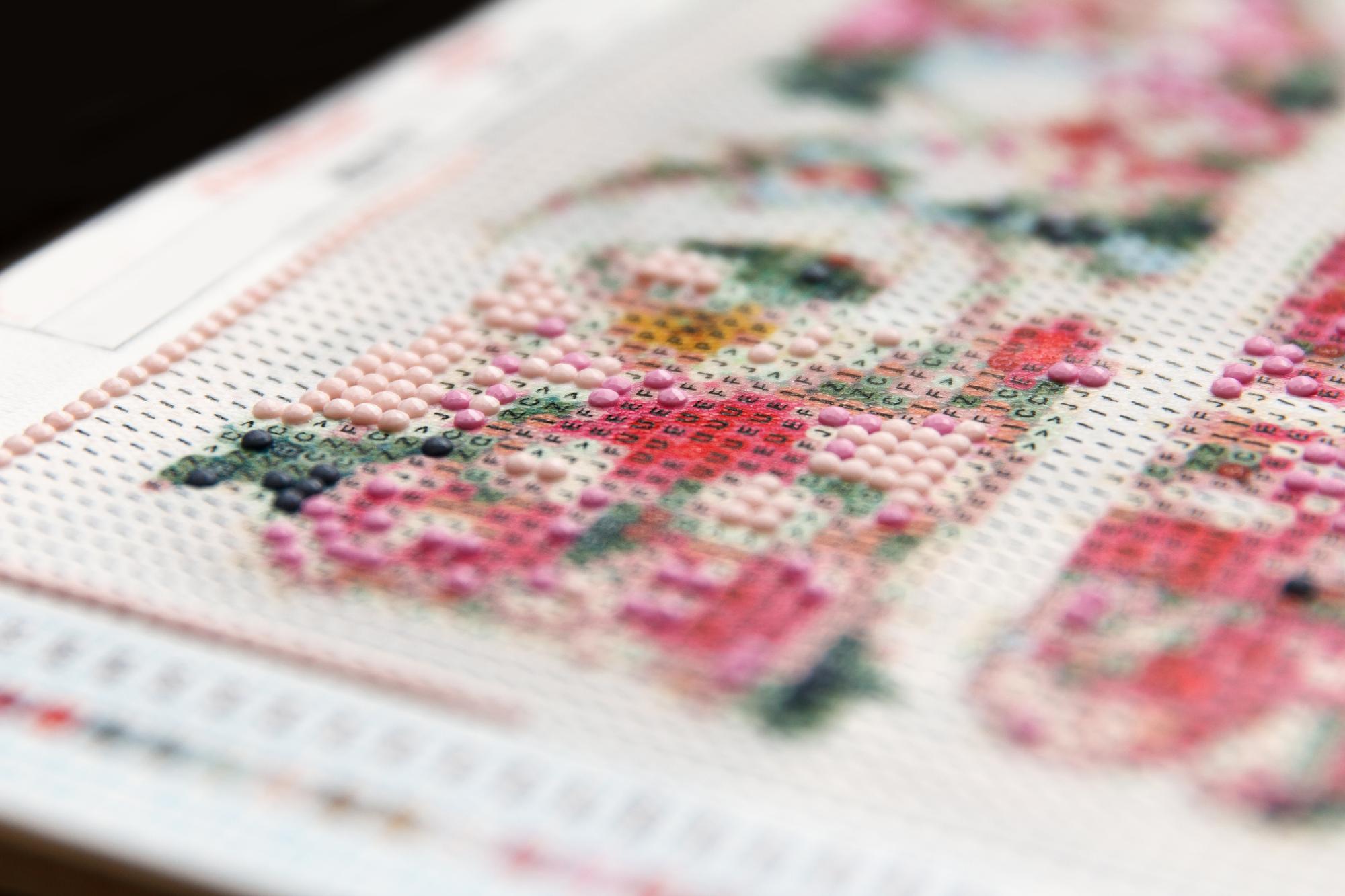 Small embroidery sample on card